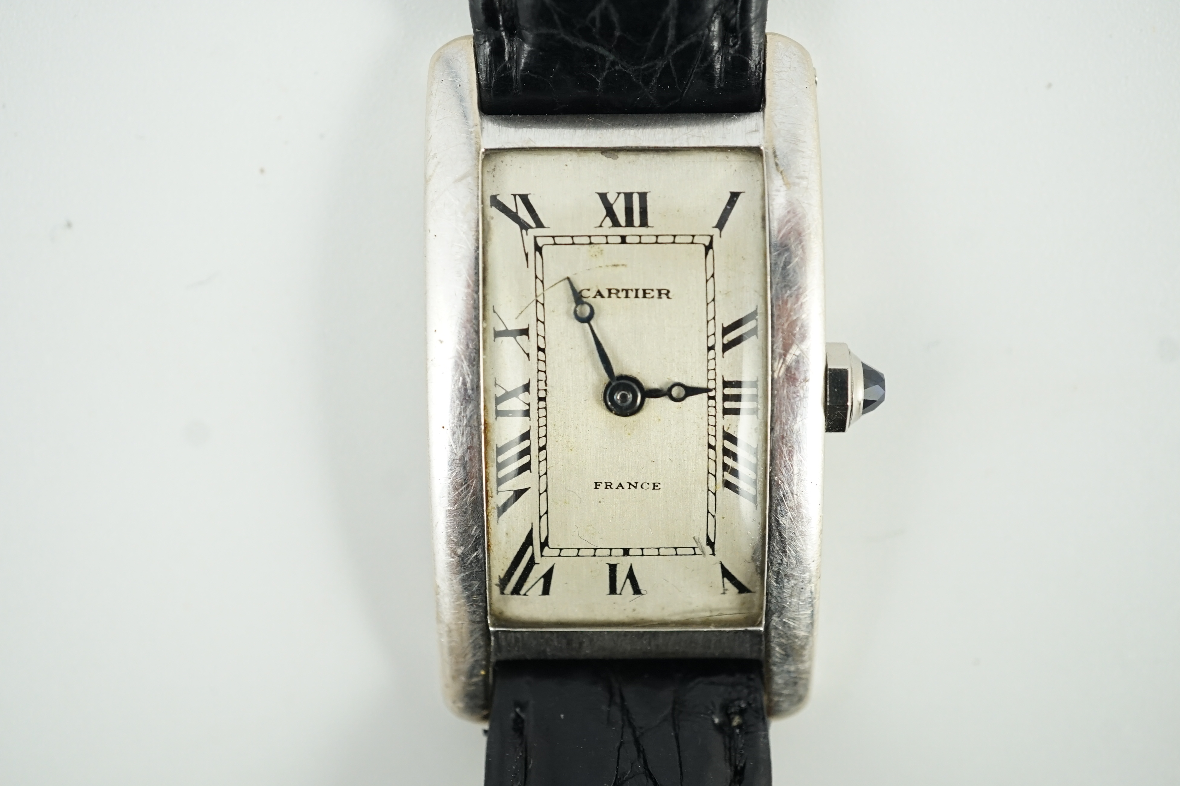 A mid 20th century 18ct white gold Cartier Tank Americane manual wind wrist watch